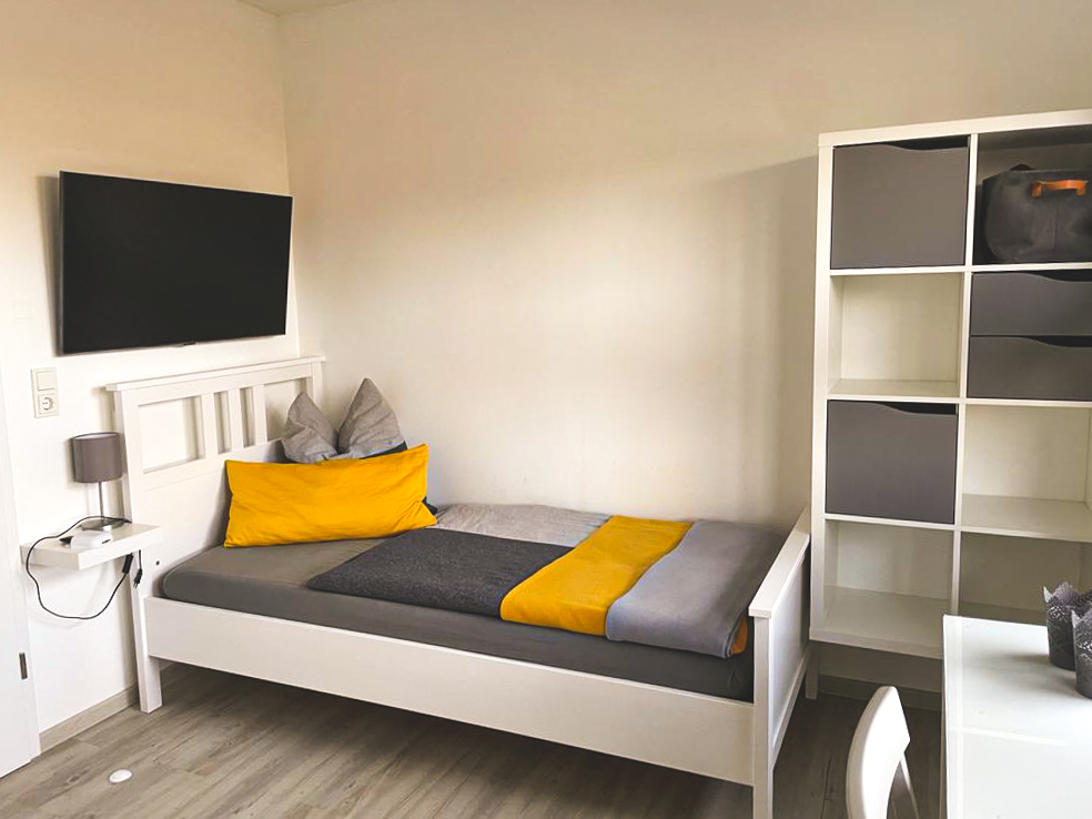 Einzelschlafzimmer obere Wohnung 2